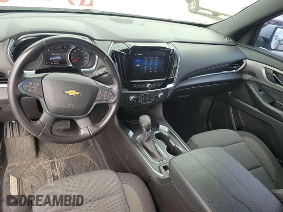 2022 Chevrolet Traverse LT Cloth z VIN 1GNEVGKWXNJ169131, wystawiony jako IAAI lot #42561409 z przebiegiem 87 915 mil mil oraz . Historia ofert i sprzedaży dostępna na DreamBid. Obrazek 1.