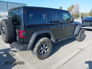 2021 Jeep Wrangler Unlimited Rubicon with VIN 1C4JJXFM5MW722572, listed as a IAAI auction lot 41667167 with Not provided miles and . Bid and sale history available at DreamBid. Image 4.