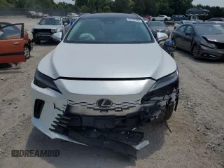 2024 Lexus RX with VIN 2T2BAMCAXRC071481, listed as a Copart auction lot 59457934 with 9,874 mi miles and Salvage Title. Bid and sale history available at carsss.com. Image 5.