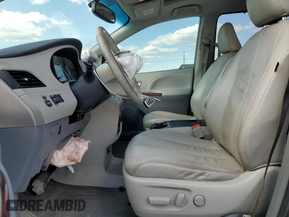 2011 Toyota Sienna XLE with VIN 5TDDK3DC2BS028058, listed as a Copart auction lot 54374215 with 216,905 mi miles and Salvage Title. Bid and sale history available at DreamBid. Image 7.