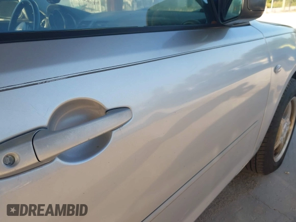 2007 Mazda Mazda3 i Sport with VIN JM1BK12F371721654, listed as a IAAI auction lot 42019268 with 120,518 mi miles. Bid and sale history available at carsss.com. Image 12.