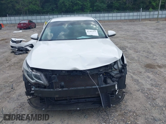 2020 Kia Optima LX with VIN 5XXGT4L3XLG385606, listed as a IAAI auction lot 42307975 with 164,000 mi miles and . Bid and sale history available at DreamBid. Image 13.