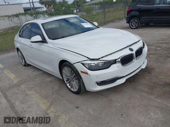 2012 BMW 3 Series 328i with VIN WBA3A5C57CF347953, listed as a IAAI auction lot 42176008 with 140,598 mi miles and . Bid and sale history available at carsss.com. Image 1.
