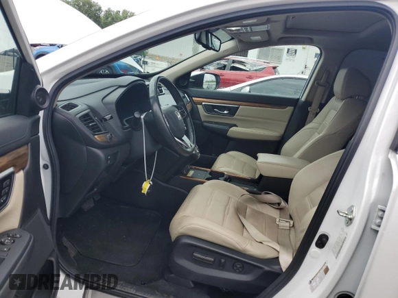 2020 Honda CR-V Touring z VIN 2HKRW2H90LH645727, wystawiony jako Copart lot #62077365 z przebiegiem 58 614 mil mil oraz Szkoda całkowita • Salvage title. Historia ofert i sprzedaży dostępna na DreamBid. Obrazek 7.