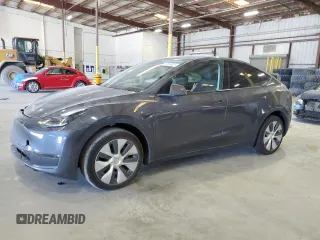 2023 Tesla Model Y Long Range z VIN 7SAYGDEE3PF862038, wystawiony jako Copart lot #57639325 z przebiegiem 11 020 mil mil oraz Szkoda całkowita • Salvage title. Historia ofert i sprzedaży dostępna na DreamBid. Obrazek 1.