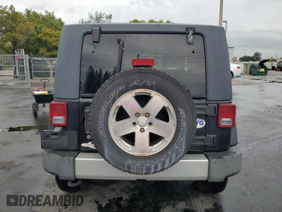 2009 Jeep Wrangler Sahara with VIN 1J4FA54109L702963, listed as a Copart auction lot 89211555 with 125,138 mi miles and Clean title. Bid and sale history available at DreamBid. Image 6.