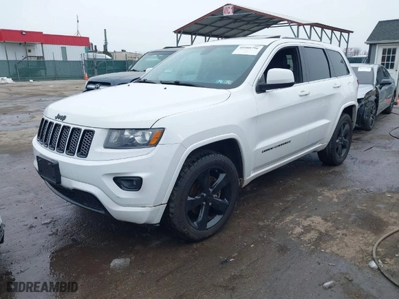 2015 Jeep Grand Cherokee Altitude with VIN 1C4RJFAG7FC954853, listed as a IAAI auction lot 40988796 with 107,002 mi miles. Bid and sale history available at carsss.com. Image 2.