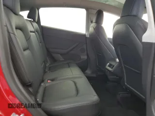 2021 Tesla Model Y Standard Range z VIN 5YJYGDED7MF111377, wystawiony jako Copart lot #45772075 z przebiegiem 34 331 mil mil oraz Szkoda całkowita • Salvage title. Historia ofert i sprzedaży dostępna na DreamBid. Obrazek 10.