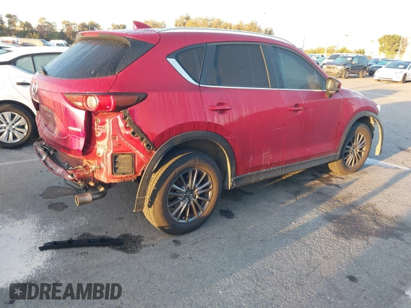 2020 Mazda CX-5 Touring z VIN JM3KFACM1L0855474, wystawiony jako IAAI lot #42004504 z przebiegiem 82 505 mil mil oraz . Historia ofert i sprzedaży dostępna na DreamBid. Obrazek 4.
