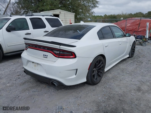 2020 Dodge Charger Scat Pack with VIN 2C3CDXGJ9LH114575, listed as a IAAI auction lot 41682792 with 137,321 mi miles. Bid and sale history available at carsss.com. Image 4.
