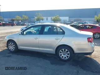 2010 Volkswagen Jetta Sedan S with VIN 3VWJZ7AJ0AM060706, listed as a IAAI auction lot 41238990 with 131,288 mi miles. Bid and sale history available at carsss.com. Image 14.