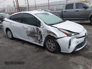 2021 Toyota Prius L Eco with VIN JTDKAMFU6M3150707, listed as a IAAI auction lot 41867272 with 55,499 mi miles and . Bid and sale history available at DreamBid. Image 1.