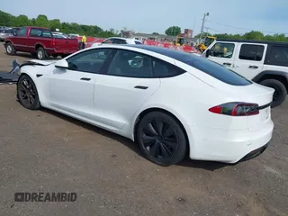 2022 Tesla Model S with VIN 5YJSA1E58NF467644, listed as a IAAI auction lot 42344403 with 52,628 mi miles and . Bid and sale history available at DreamBid. Image 3.