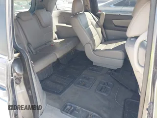 2012 Honda Odyssey EX-L with VIN 5FNRL5H69CB047425, listed as a IAAI auction lot 42064979 with 242,409 mi miles and . Bid and sale history available at carsss.com. Image 8.