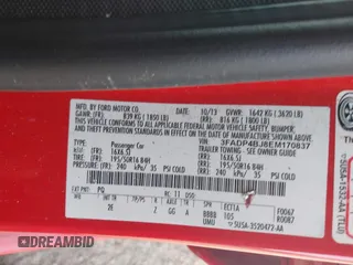 2014 Ford Fiesta SE with VIN 3FADP4BJ8EM170837, listed as a IAAI auction lot 41656071 with 128,334 mi miles and . Bid and sale history available at DreamBid. Image 9.
