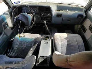1990 Ford Bronco z VIN 1FMCU12T2LUA31399, wystawiony jako Copart lot #77099614 z przebiegiem 85 663 mil mil oraz Szkoda całkowita • Salvage title. Historia ofert i sprzedaży dostępna na DreamBid. Obrazek 8.