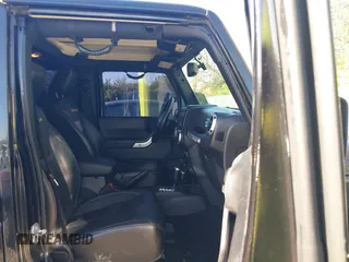 2015 Jeep Wrangler Unlimited Wrangler X with VIN 1C4BJWEG7FL677343, listed as a IAAI auction lot 42147411 with 105,920 mi miles and . Bid and sale history available at DreamBid. Image 5.