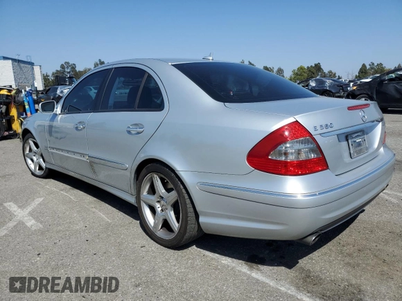 2008 Mercedes-Benz E 550 Sport with VIN WDBUF72X98B297805, listed as a Copart auction lot 61970255 with 248,178 mi miles and Salvage title. Bid and sale history available at DreamBid. Image 2.