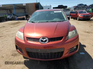 2008 Mazda CX-7 Grand Touring z VIN JM3ER29LX80190946, wystawiony jako Copart lot #61860475 z przebiegiem 136 545 mil mil oraz Czysty tytuł • Clean title. Historia ofert i sprzedaży dostępna na DreamBid. Obrazek 5.