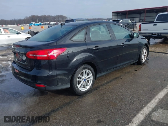 2017 Ford Focus SE with VIN 1FADP3F22HL291947, listed as a IAAI auction lot 41137748 with 156,527 mi miles and . Bid and sale history available at DreamBid. Image 4.