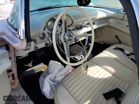 1957 Ford Thunderbird with VIN D7FH309658, listed as a Copart auction lot 75299494 with 50,865 mi miles and Salvage Title. Bid and sale history available at DreamBid. Image 8.