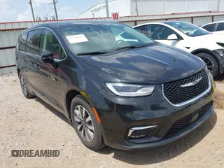 2023 Chrysler Pacifica Hybrid Touring L with VIN 2C4RC1L70PR622000, listed as a IAAI auction lot 42711826 with 65,109 mi miles and . Bid and sale history available at DreamBid. Image 1.