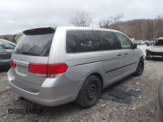 2010 Honda Odyssey LX with VIN 5FNRL3H26AB008709, listed as a IAAI auction lot 41836230 with 168,267 mi miles and . Bid and sale history available at DreamBid. Image 4.