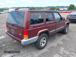 2000 Jeep Cherokee with VIN 1J4FF48SXYL148361, listed as a IAAI auction lot 42786017 with 159,908 mi miles and . Bid and sale history available at DreamBid. Image 4.