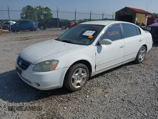 2002 Nissan Altima SL z VIN 1N4AL11DX2C279807, wystawiony jako IAAI lot #42482548 z przebiegiem 208 233 mil mil oraz . Historia ofert i sprzedaży dostępna na DreamBid. Obrazek 2.