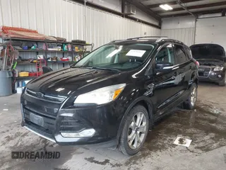 2015 Ford Escape Titanium with VIN 1FMCU9J98FUC70495, listed as a IAAI auction lot 41978543 with 129,974 mi miles. Bid and sale history available at carsss.com. Image 2.