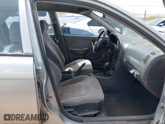 2001 Kia Sephia with VIN KNAFB121815081573, listed as a IAAI auction lot 42058297 with 112,069 mi miles and . Bid and sale history available at DreamBid. Image 5.