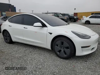 2021 Tesla Model 3 Standard Range Plus z VIN 5YJ3E1EAXMF065760, wystawiony jako Copart lot #54235345 z przebiegiem 54 413 mil mil oraz Szkoda całkowita • Salvage title. Historia ofert i sprzedaży dostępna na DreamBid. Obrazek 4.