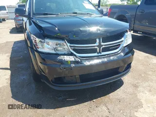 2017 Dodge Journey SE with VIN 3C4PDCAB9HT562563, listed as a IAAI auction lot 42113181 with 86,136 mi miles and . Bid and sale history available at DreamBid. Image 6.