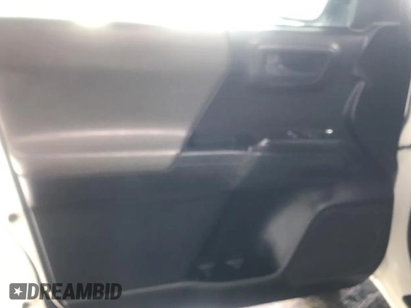 2017 Toyota Tacoma SR z VIN 5TFRX5GN4HX081282, wystawiony jako IAAI lot #42434418 z przebiegiem 184 905 mil mil oraz . Historia ofert i sprzedaży dostępna na DreamBid. Obrazek 21.