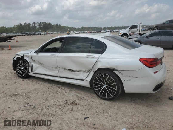 2019 BMW 7 Series 750i с VIN WBA7F0C52KGM24906, выставлен на аукционе Copart как лот 53934735 с пробегом 96 247 миль миль и Списание • Salvage title. История ставок и продаж доступна на DreamBid. Изображение 2.
