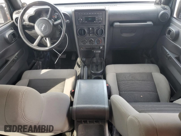 2008 Jeep Wrangler Unlimited X with VIN 1J4GA39188L520203, listed as a Copart auction lot 55226525 with 144,560 mi miles and Salvage Title. Bid and sale history available at carsss.com. Image 8.
