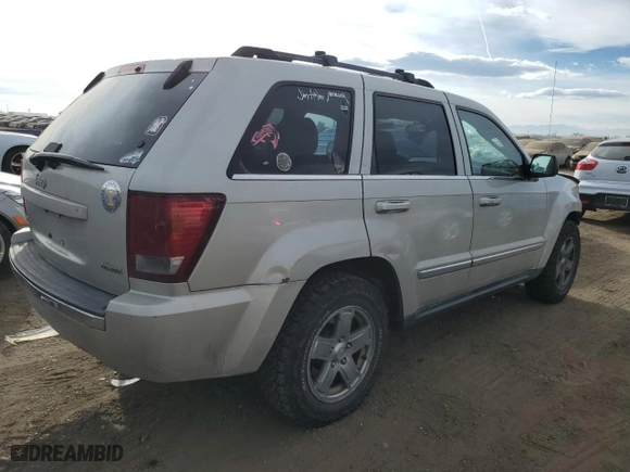 2007 Jeep Grand Cherokee Limited with VIN 1J8HR58237C539497, listed as a Copart auction lot 87015414 with 245,708 mi miles and Salvage Title. Bid and sale history available at carsss.com. Image 3.