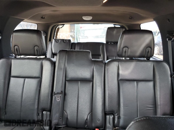 2011 Ford Expedition Limited with VIN 1FMJU2A53BEF42709, listed as a Copart auction lot 56791995 with 130,867 mi miles and Salvage title. Bid and sale history available at DreamBid. Image 10.