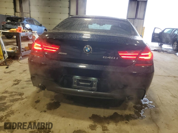 2015 BMW 6 Series 640i xDrive z VIN WBA6B8C58FD453159, wystawiony jako Copart lot #88931285 z przebiegiem 145 656 mil mil oraz Szkoda całkowita • Salvage title. Historia ofert i sprzedaży dostępna na DreamBid. Obrazek 6.