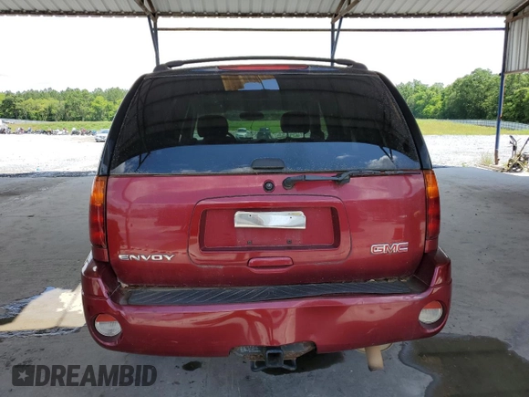 2006 GMC Envoy SLT with VIN 1GKDT13S862248719, listed as a Copart auction lot 56990474 with Not Provided miles and Clean Title. Bid and sale history available at DreamBid. Image 6.