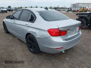 2014 BMW 3 Series 320i xDrive with VIN WBA3C3C58EP661364, listed as a IAAI auction lot 41947049 with 211,982 mi miles and . Bid and sale history available at DreamBid. Image 3.