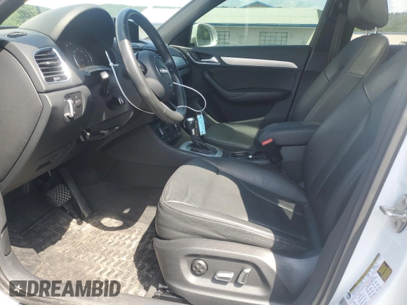 2018 Audi Q3 Premium with VIN WA1ECCFS8JR024576, listed as a Copart auction lot 64018985 with 128,784 mi miles and Clean title. Bid and sale history available at DreamBid. Image 7.