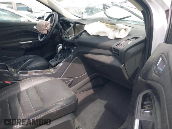 2015 Ford Escape Titanium with VIN 1FMCU0J91FUB13810, listed as a IAAI auction lot 41961798 with 139,265 mi miles. Bid and sale history available at carsss.com. Image 5.