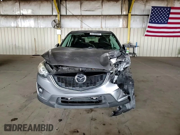 2014 Mazda CX-5 Touring z VIN JM3KE2CY7E0349484, wystawiony jako Copart lot #51188665 z przebiegiem 175 131 mil mil oraz Szkoda całkowita • Salvage title. Historia ofert i sprzedaży dostępna na DreamBid. Obrazek 11.