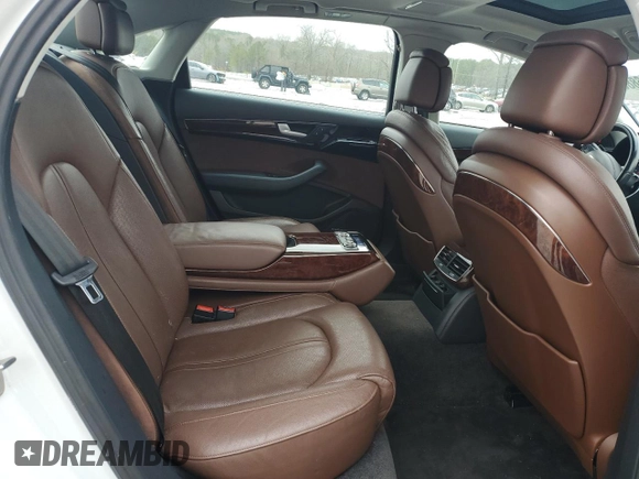 2014 Audi A8 3.0T z VIN WAURGAFD3EN003758, wystawiony jako Copart lot #47636885 z przebiegiem 166 990 mil mil oraz Szkody całkowita. Historia ofert i sprzedaży dostępna na DreamBid. Obrazek 10.