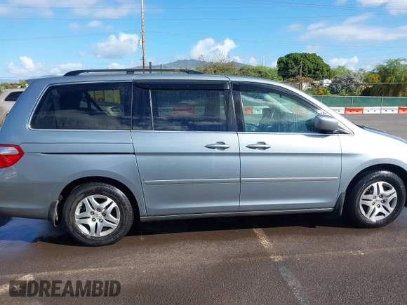 2007 Honda Odyssey EX-L with VIN 5FNRL38677B021464, listed as a IAAI auction lot 41568582 with 131,359 mi miles and . Bid and sale history available at DreamBid. Image 13.