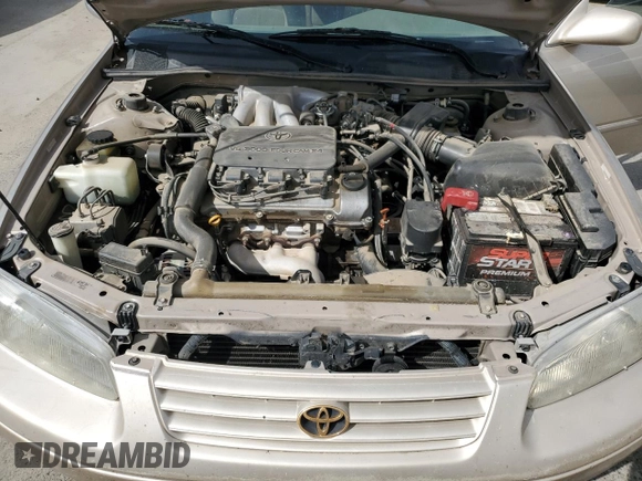 1998 Toyota Camry LE z VIN JT2BF28K4W0114447, wystawiony jako Copart lot #50846275 z przebiegiem 288 989 mil mil oraz Szkoda całkowita • Salvage title. Historia ofert i sprzedaży dostępna na DreamBid. Obrazek 11.