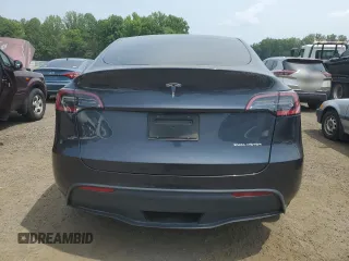 2024 Tesla Model Y Long Range z VIN 7SAYGDEE2RF986871, wystawiony jako Copart lot #60168535 z przebiegiem 15 647 mil mil oraz Szkoda całkowita • Salvage title. Historia ofert i sprzedaży dostępna na DreamBid. Obrazek 6.