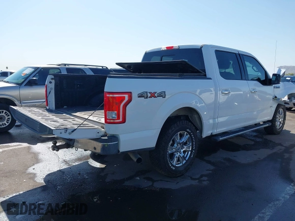 2015 Ford F-150 XLT with VIN 1FTEW1EP0FKE42273, listed as a IAAI auction lot 41988265 with 119,483 mi miles. Bid and sale history available at carsss.com. Image 4.
