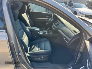 2023 Cadillac XT4 AWD Premium Luxury z VIN 1GYFZDR40PF108407, wystawiony jako Copart lot #86400754 z przebiegiem 8 724 mil mil oraz Nie do naprawy • Non repairable. Historia ofert i sprzedaży dostępna na DreamBid. Obrazek 6.